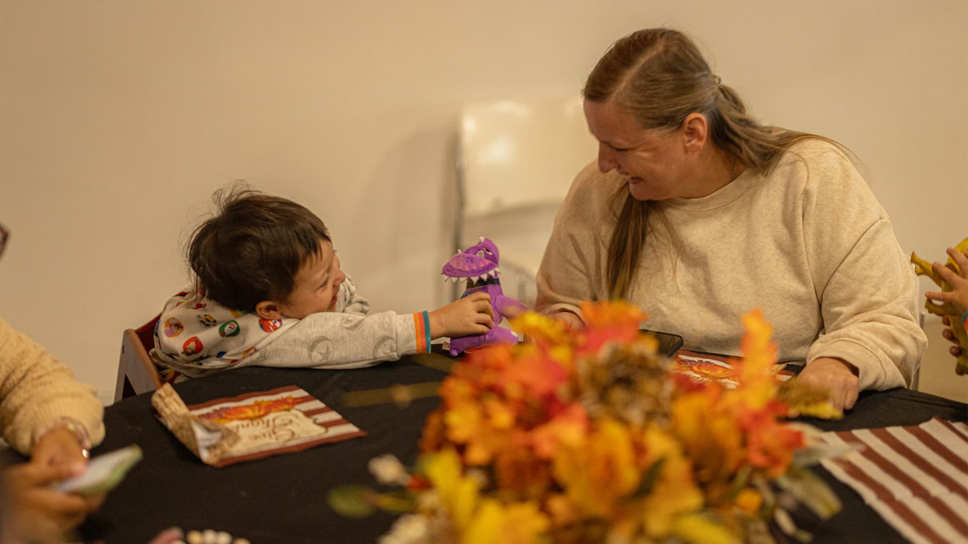 A family spending time together at a Citychurch holiday table